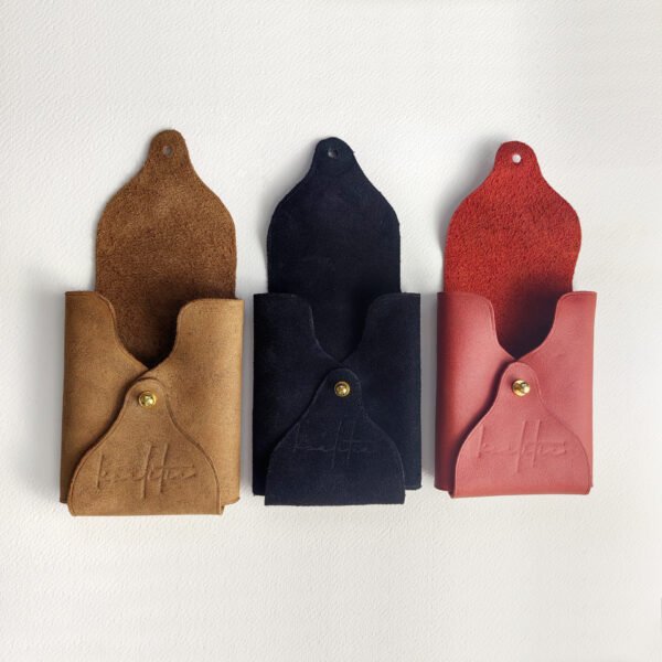 Hand crafted leather cases for the sports playing cards decks.