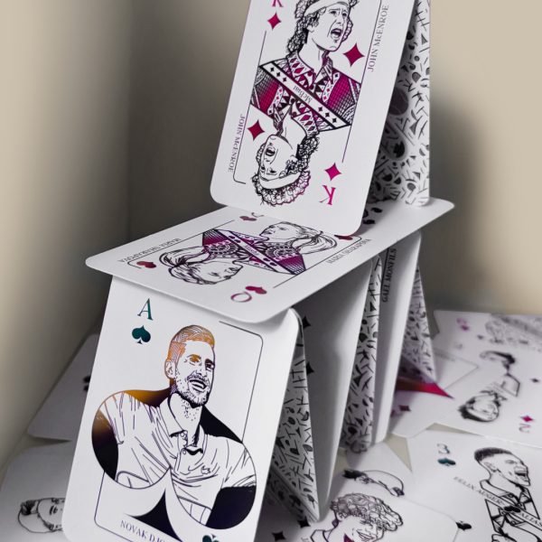 House of cards made out of illustrated tennis playing cards.