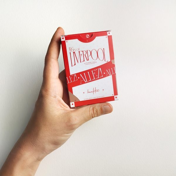 The Story of Liverpool Playing Cards held in hand