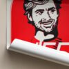 The Carlos Sainz portrait is shipped rolled and wrapped in acid-free black paper, tied with a red ribbon, ready to gift inside a sturdy cardboard mailing tube.