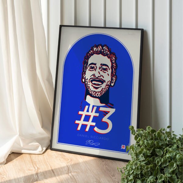 Daniel Ricciardo framed artwork displayed on a wall, printed on premium paper with AlphaTauri colours and fine artistic detail.