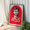 Carlos Sainz framed artwork displayed on a wall, printed on premium paper with rich Ferrari red tones and fine artistic detail.