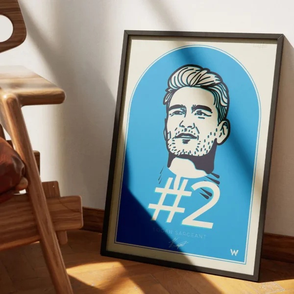 Logan Sargeant framed artwork displayed on a wall, printed on premium paper with Williams' blue and white colours and fine artistic detail.