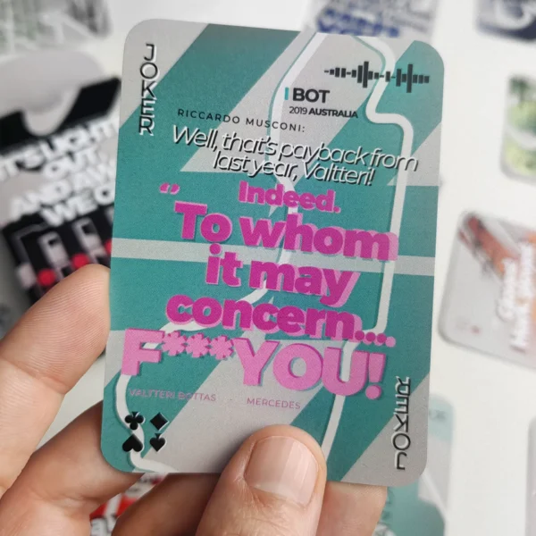 Detail of individual playing card from the F1 Radio Messages deck, featuring illustrated quotes of Bottas " To whom it may concern, F you"