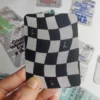 Detail with the back of the cards from the F1 Radio Messages deck.