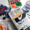 F1 Radio Messages Playing Cards - 54 hand-drawn illustrated poker deck featuring iconic Formula 1 cockpit quotes from Hamilton, Verstappen, Norris and more.