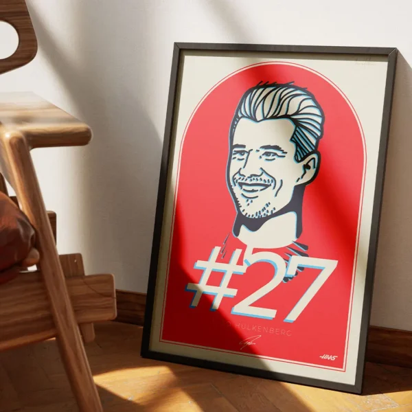 Nico Hulkenberg framed art displayed on a wall, printed on premium paper with Haas' bold red and white colours and fine artistic detail.