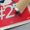 Close-up detail of the hand-drawn portrait artwork from the Nico Hulkenberg Print, showcasing the Haas emblem and Hulkenberg's signed print with racing number #27.